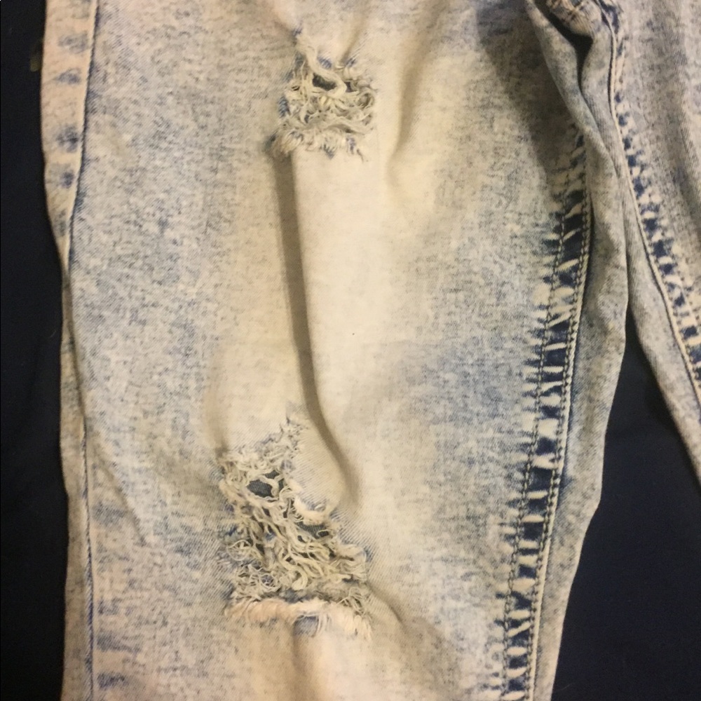 Jean capris with rips in them